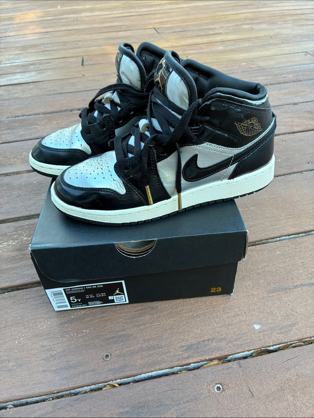 Nike Air Jordan 1 Mid GS Black and Metallic Silver Youth